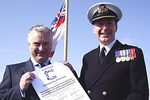 Gerald Vernon Jackson and Sir Tony Radakin signing the Portsmouth Military Covenant in 2012