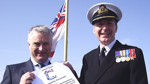 Gerald Vernon Jackson and Sir Tony Radakin sign the Portsmouth Military Covenant in 2012