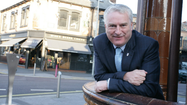 Cllr Gerald Vernon-Jackson stands outside the Kings Theatre, Southsea